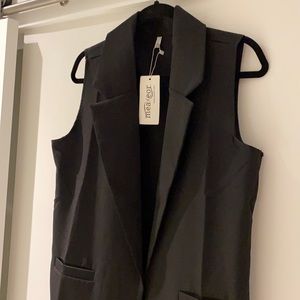 Black sleeveless Blazer vest. Never worn!